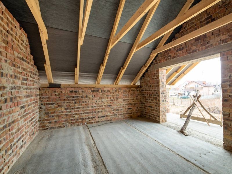 A Photo of attic insulation https://houstonrestorationgroup.com/wp-content/uploads/2023/08/attic-repair-attic-restoration-attic-insulation-attic-cleaning-attic-ventilation-attic-sealing-attic-waterproofing-attic-mold-removal-attic-pest-control-attic-structural-repair-attic-leak-repair-attic-energy-efficiency-home-improvement-9b8e0b5c.jpg